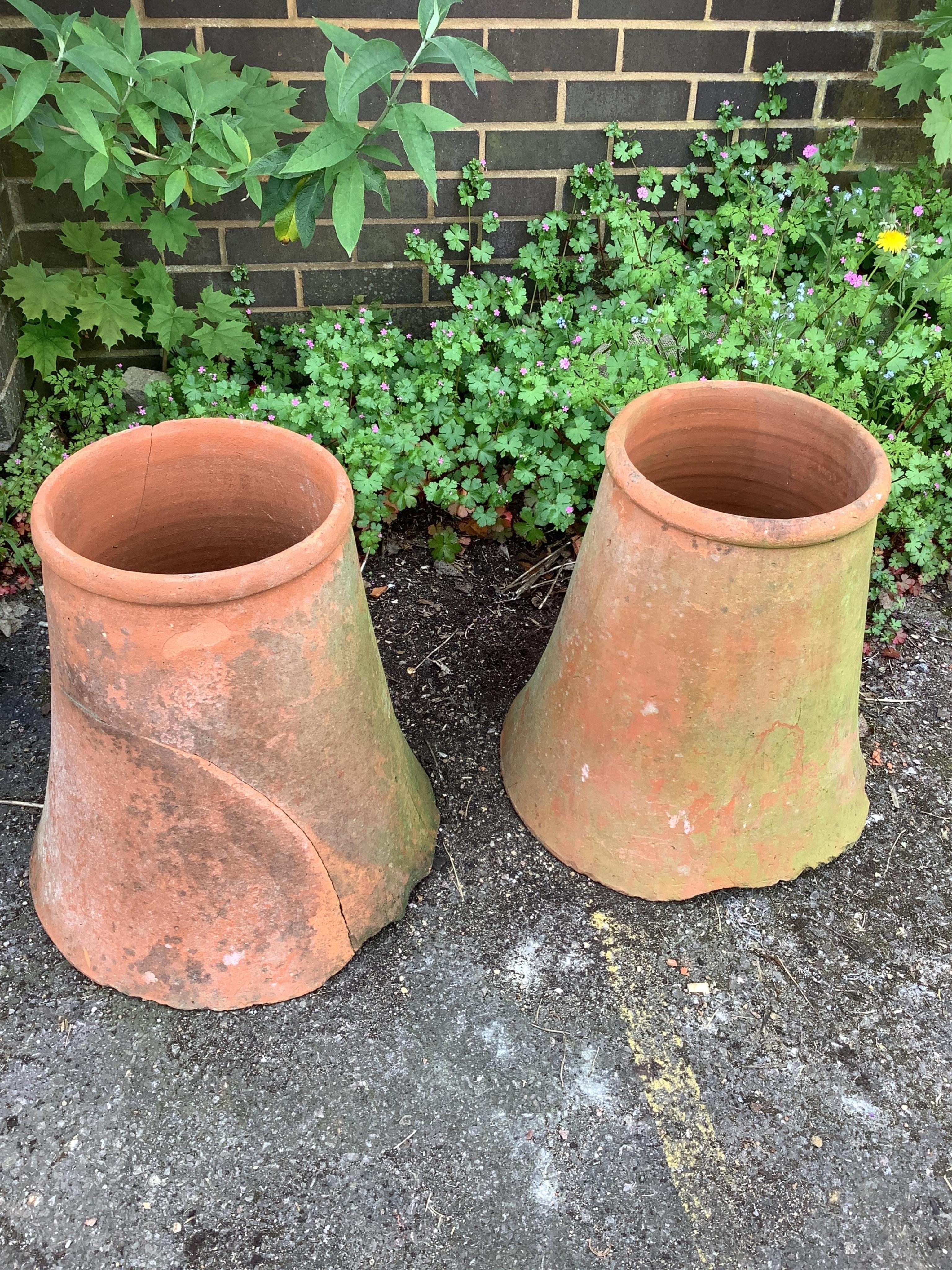 A pair of terracotta rhubarb planters, height 46cm (one severely cracked)
